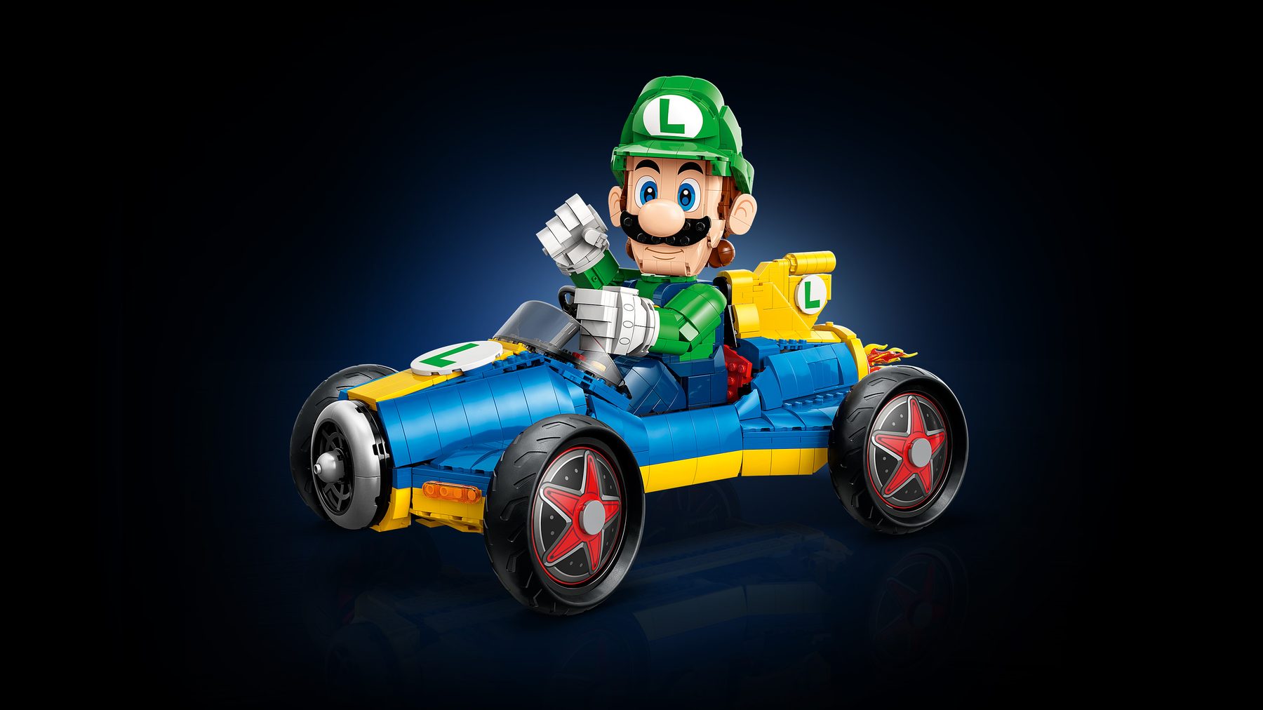 Official LEGO three-quarter view of Mario Kart Luigi Mach 8 with Luigi raising one fist