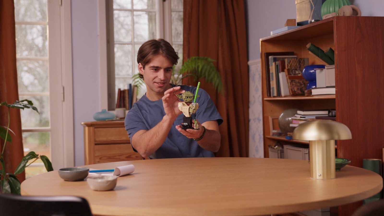 Official LEGO image of LEGO Star Wars 75438 Yoda Bust shown with the minifigure and stand