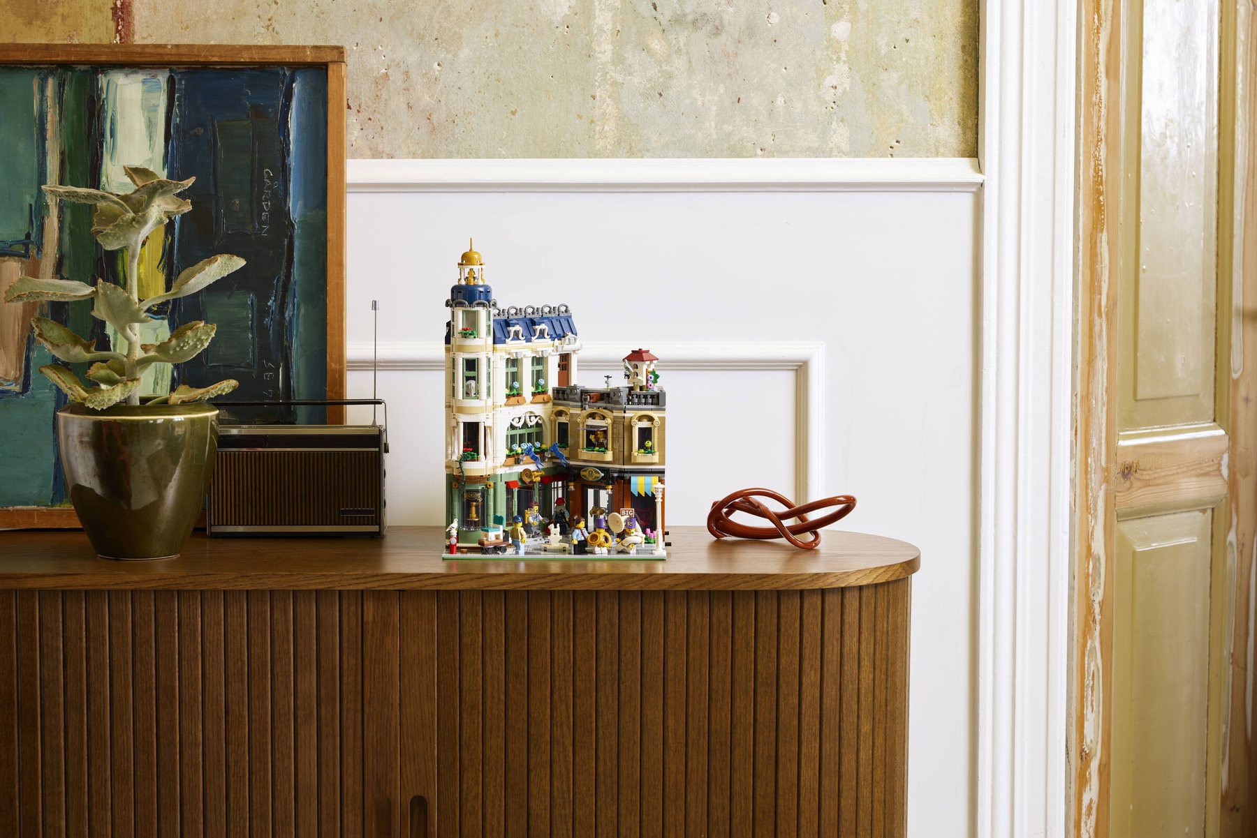 Official LEGO lifestyle image of LEGO Icons 11371 Shopping Street on display