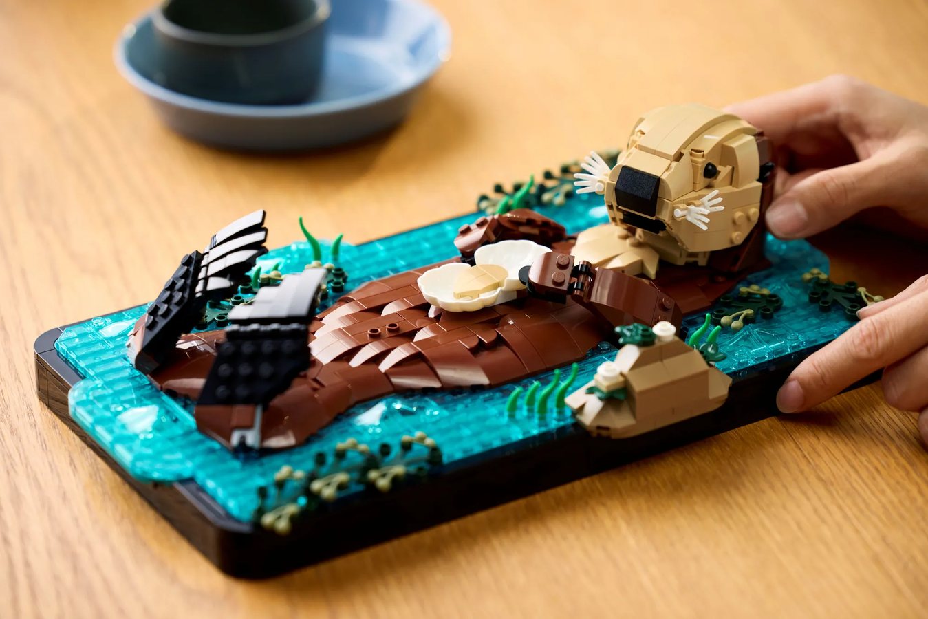 Official LEGO Ideas behind-the-scenes image showing development of LEGO Ideas 21366 Floating Sea Otters