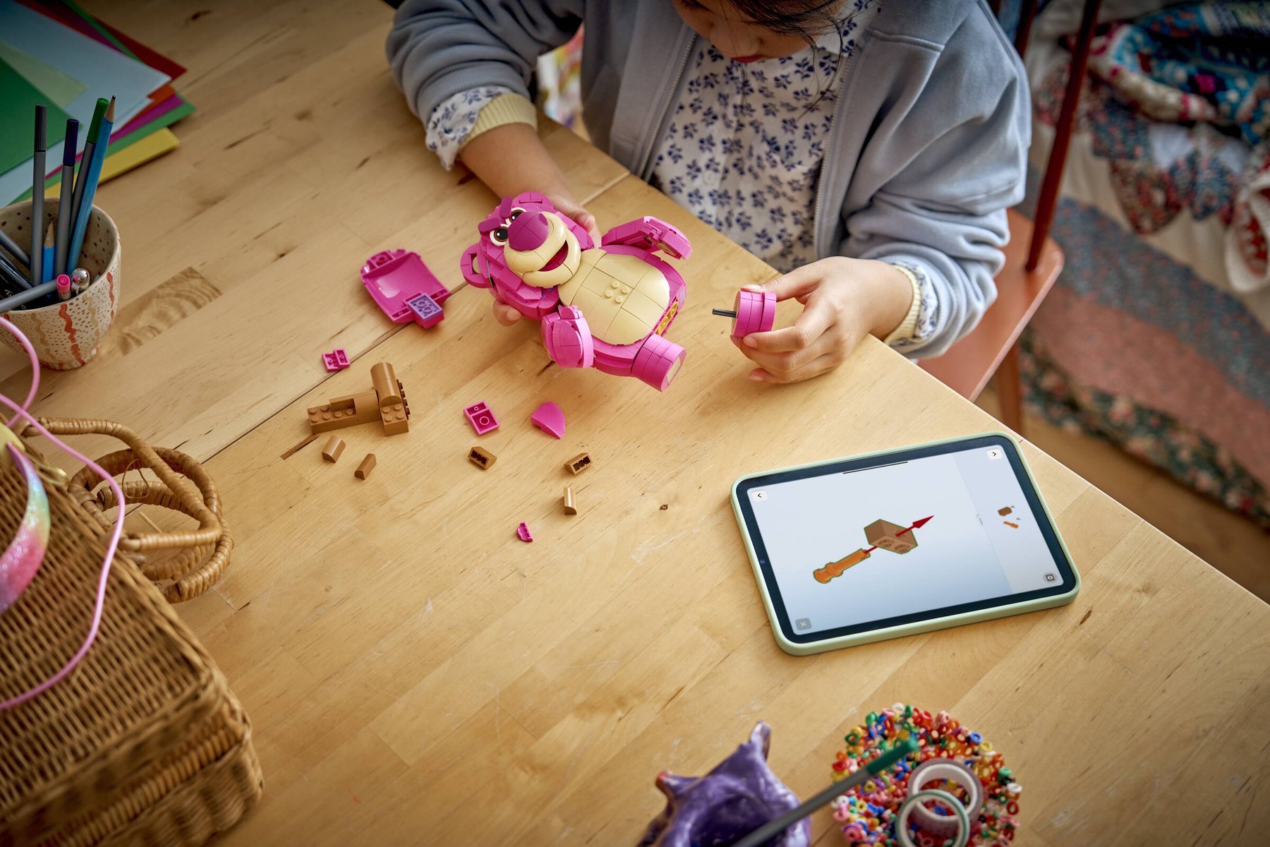 Official LEGO lifestyle image of 43306 Lotso during the build