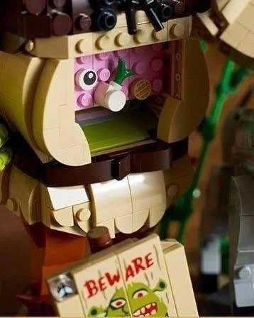 Leaked close-up image of LEGO Shrek 72423 showing a hidden storage compartment inside Shrek