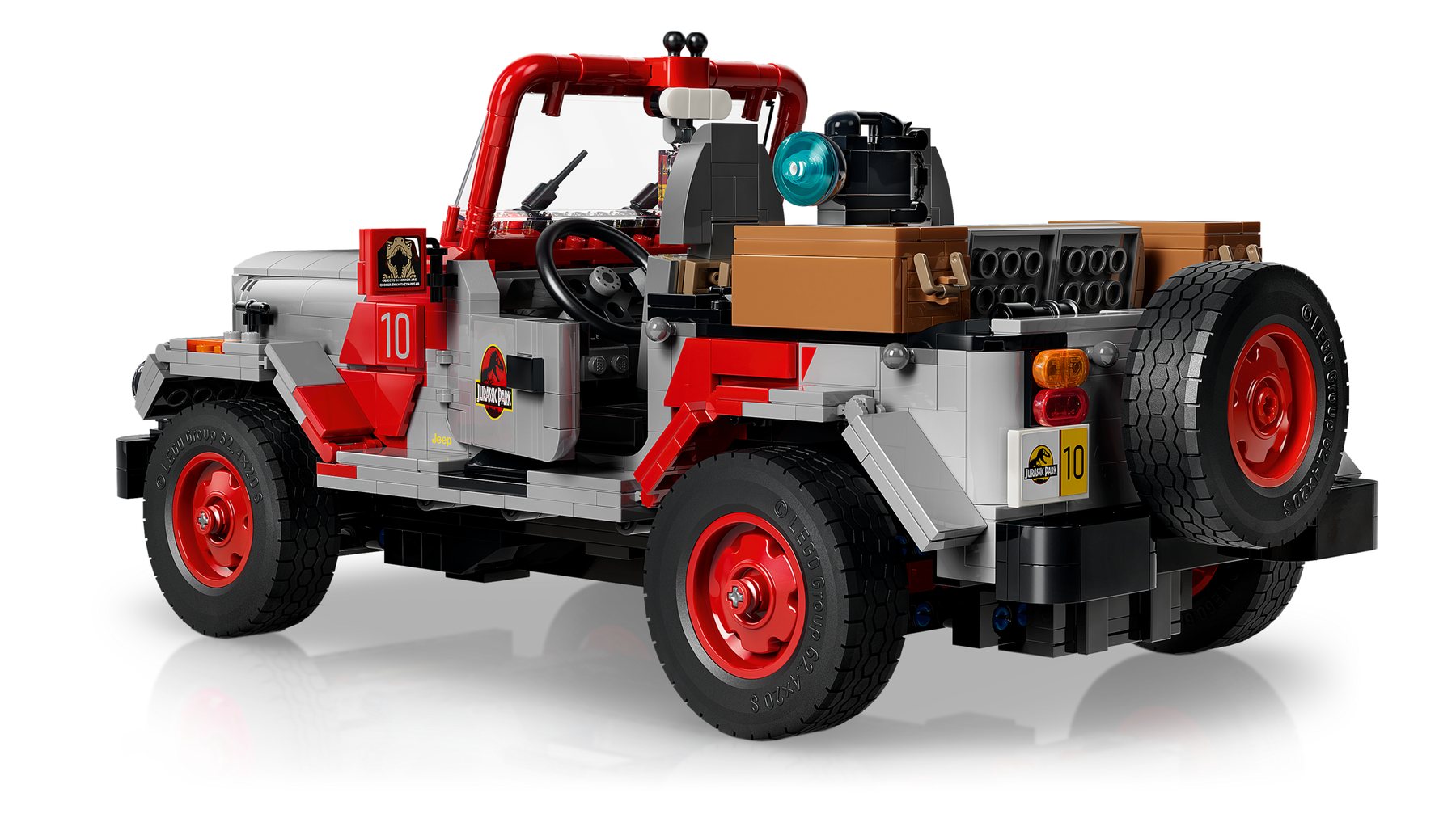 Official LEGO image of Jurassic Park Jeep Wrangler 77984 with accessories and movie references