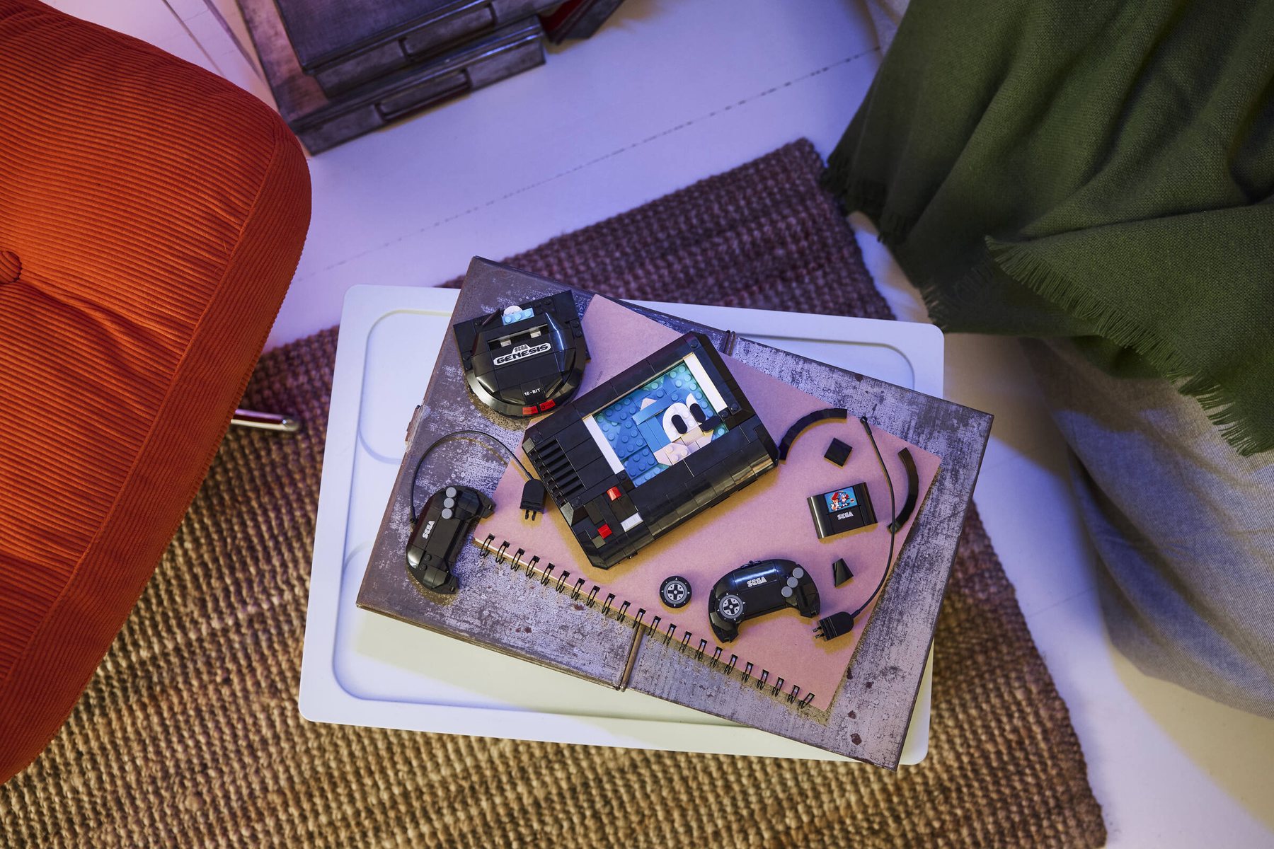 Official LEGO lifestyle image of LEGO 40926 SEGA Genesis Console on display
