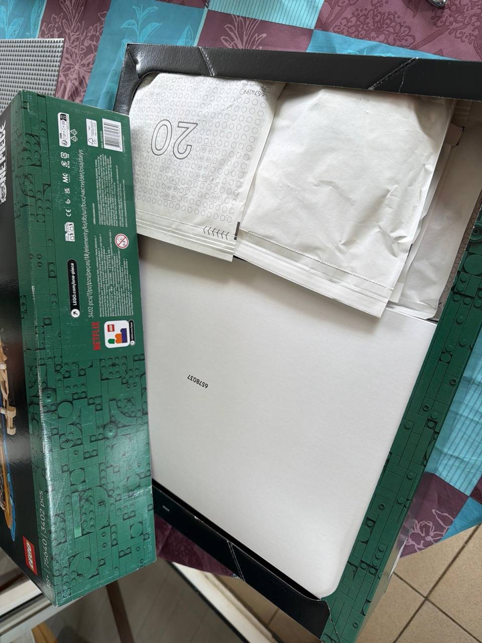 Leaked photo showing the opened packaging of LEGO 75640 The Baratie Floating Restaurant