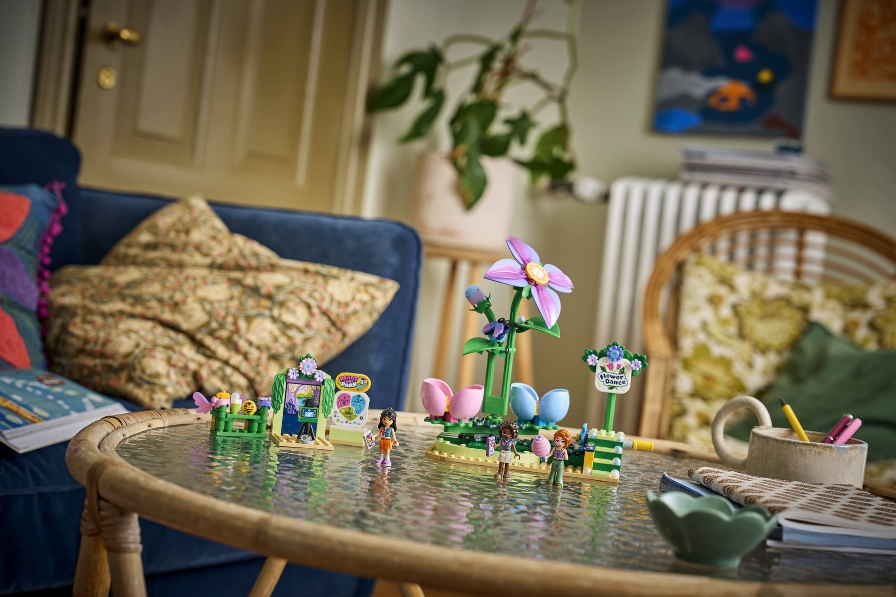 Official environmental image of LEGO Friends 42702 Spinning Flower and Fairy Teacup Ride