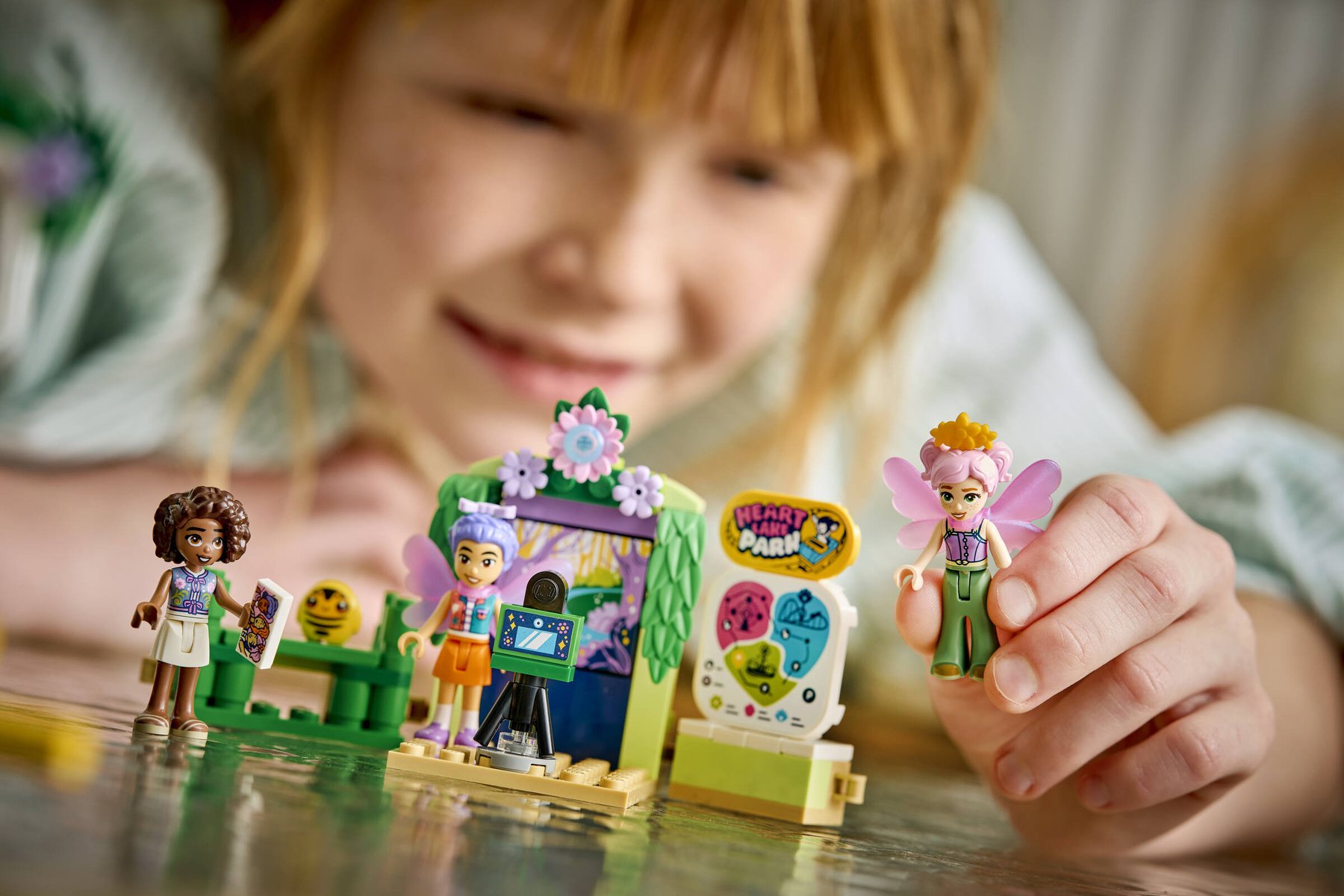 Second official lifestyle image of LEGO Friends 42702 Spinning Flower and Fairy Teacup Ride