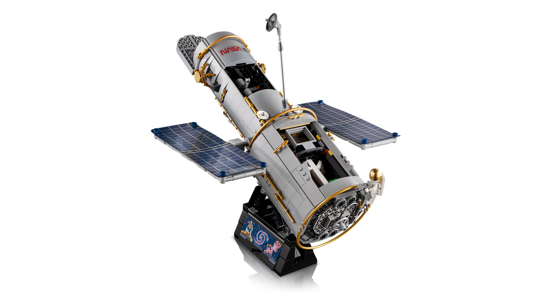 A LEGO® Icons Hubble Space Telescope set on a stand with the exterior panels removed, revealing the instrument bay.
