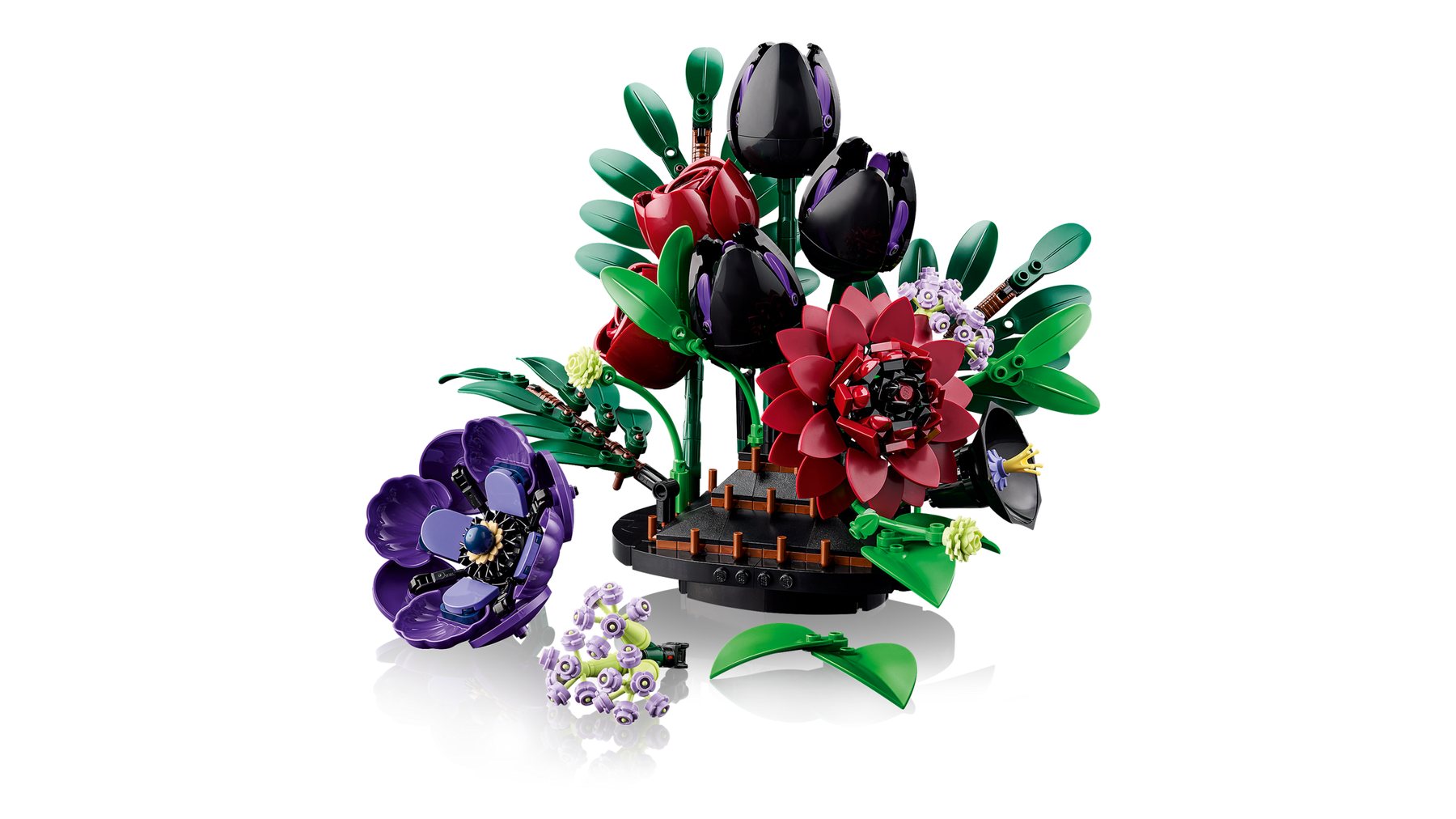 A LEGO® Botanicals Dark Flower Arrangement featuring 7 types of flowers, including tulips, roses and anemone.